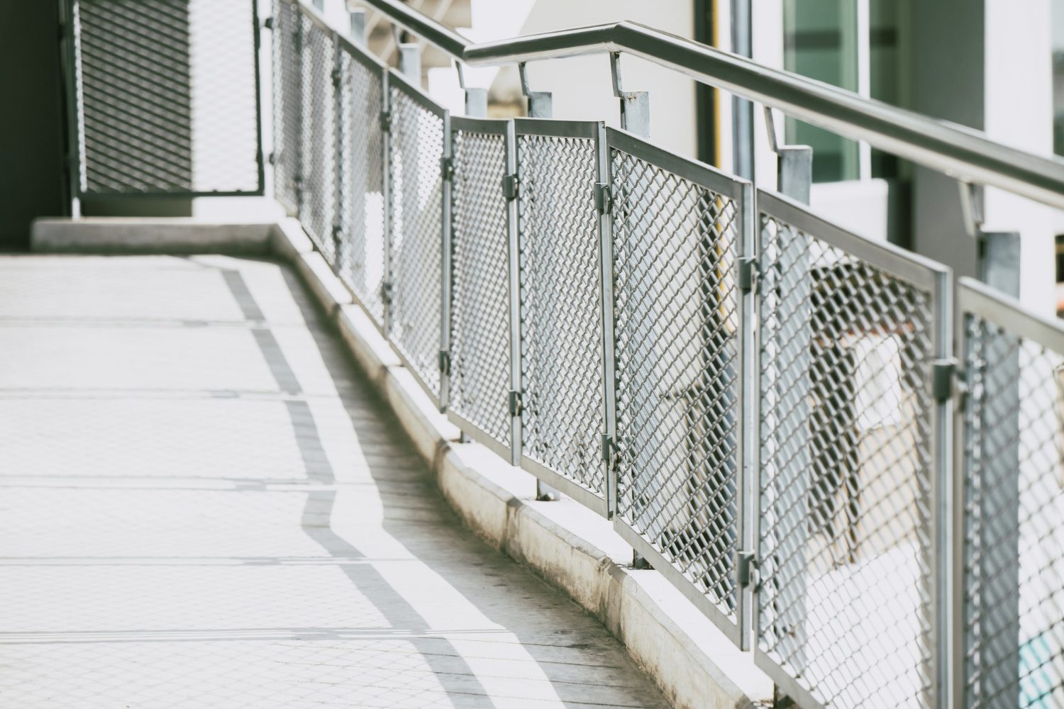 sidewalks-footpath-with-metal-fences-stainless-steel-handles-safety-walk-modern-urban-style-scaled